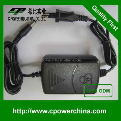 Schwarz-Weiß 12V 2A 24V 1A Stromversorgungsadapter für LED-Streifenlicht