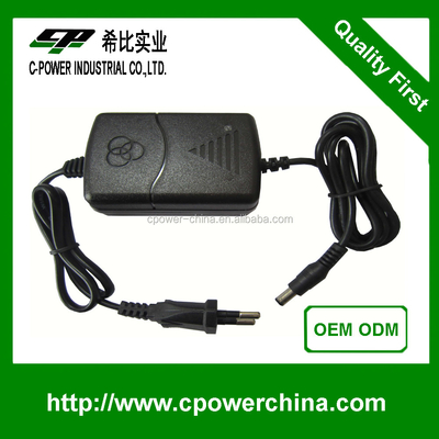 Schwarz-Weiß 12V 2A 24V 1A Stromversorgungsadapter für LED-Streifenlicht